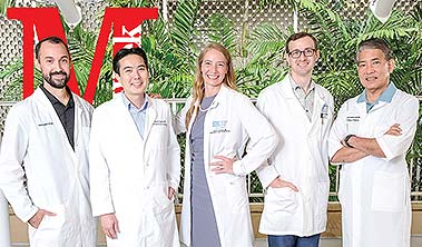 MidWeek cover with five physicians in white coats.