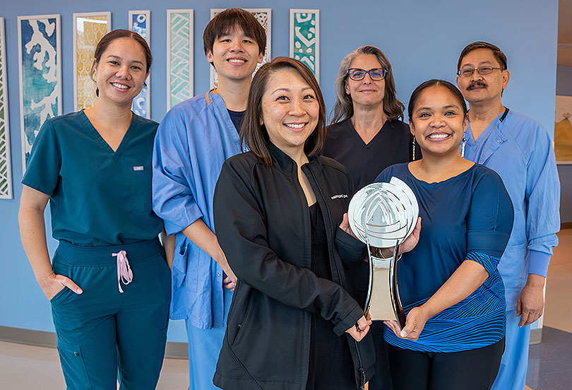 Representatives from across Hawaii Pacific Health posing with the 2026 Gallup Great Workplace Award.