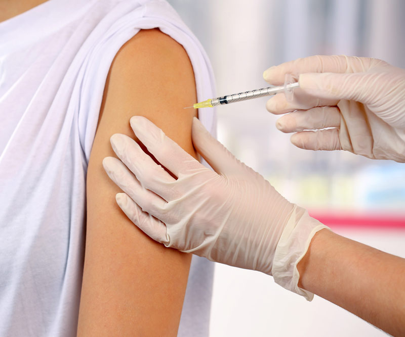 patient getting a immunization shot