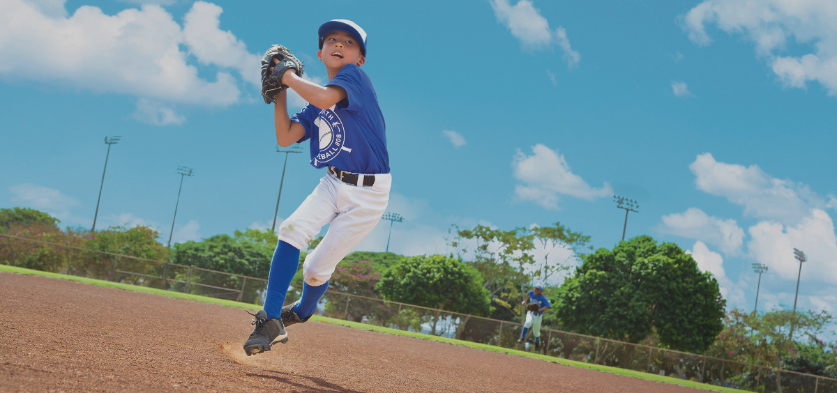 Image of a boy pitching a baseball