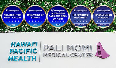 Healthgrades medallions for various distinctions in specialty care alongside Pali Momi signage.