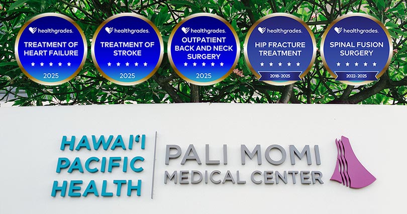 Healthgrades medallions for various distinctions in specialty care alongside Pali Momi signage.