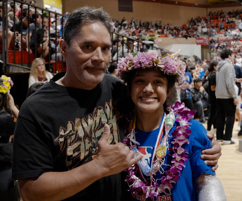 Pat Hokoana and his daughter Anela at the 2024 Hawaii High School Athletic Association Wrestling State Championships