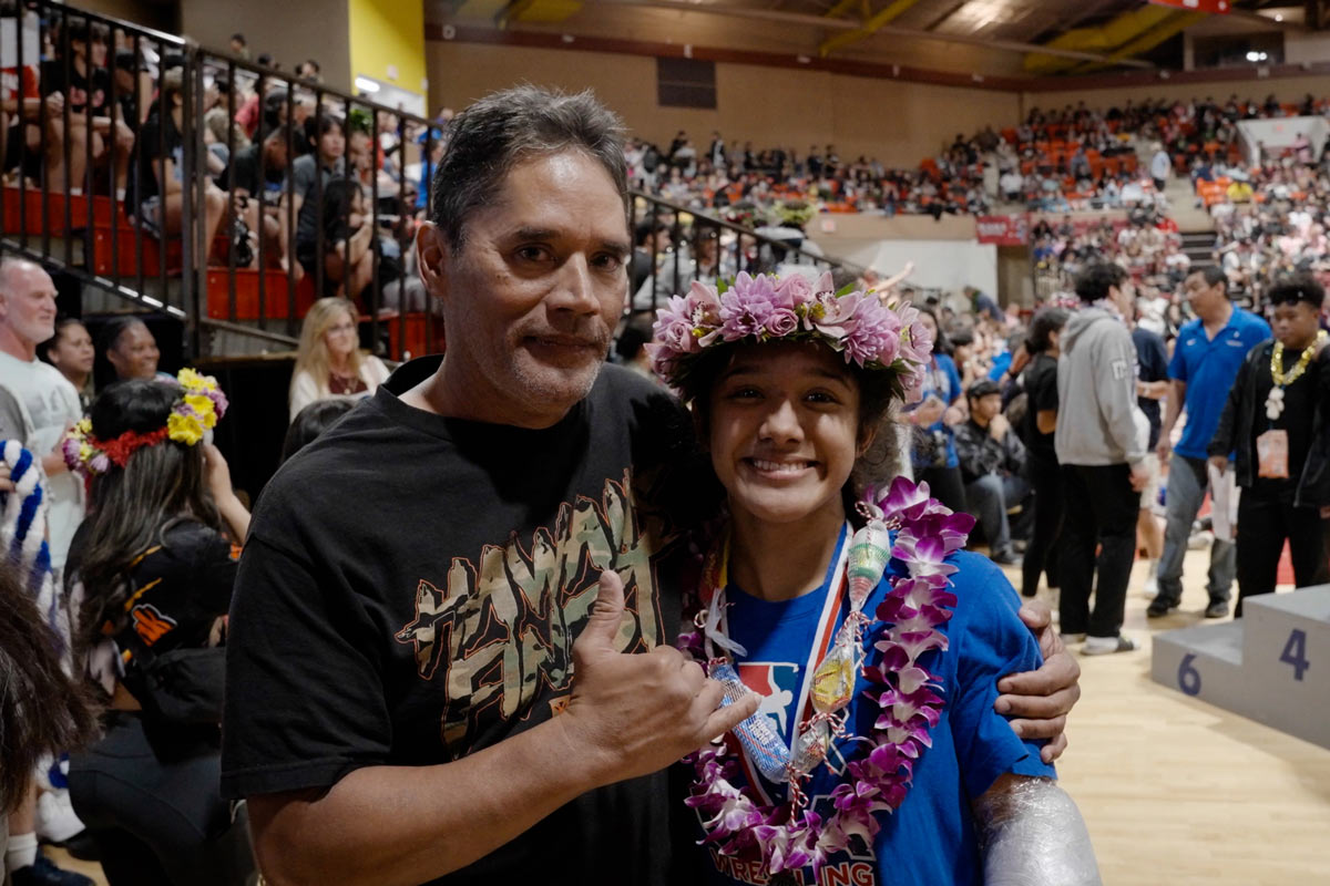 Pat Hokoana and his daughter Anela at the 2024 Hawaii High School Athletic Association Wrestling State Championships