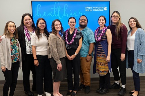 Members of the Kapiolani medical social services team and the UH School of Law's MLPC team.