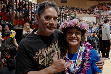 Pat Hokoana and his daughter Anela at the 2024 Hawaii High School Athletic Association Wrestling State Championships